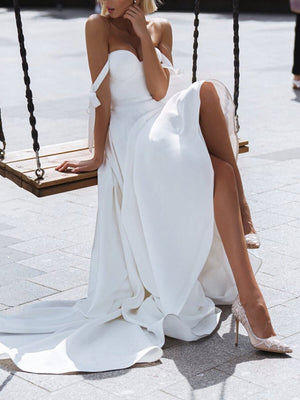 Elegante vestido largo blanco con hombros colgantes y cordones